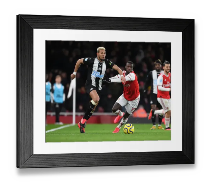 Framed Print : Arsenal vs Newcastle United: Premier League Showdown at Emirates Stadium Framed Print : Arsenal vs Newcastle United: Premier League Showdown at Emirates Stadium