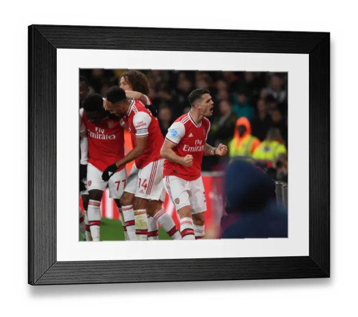 Framed Print : Arsenal vs Newcastle United: Premier League Showdown at Emirates Stadium