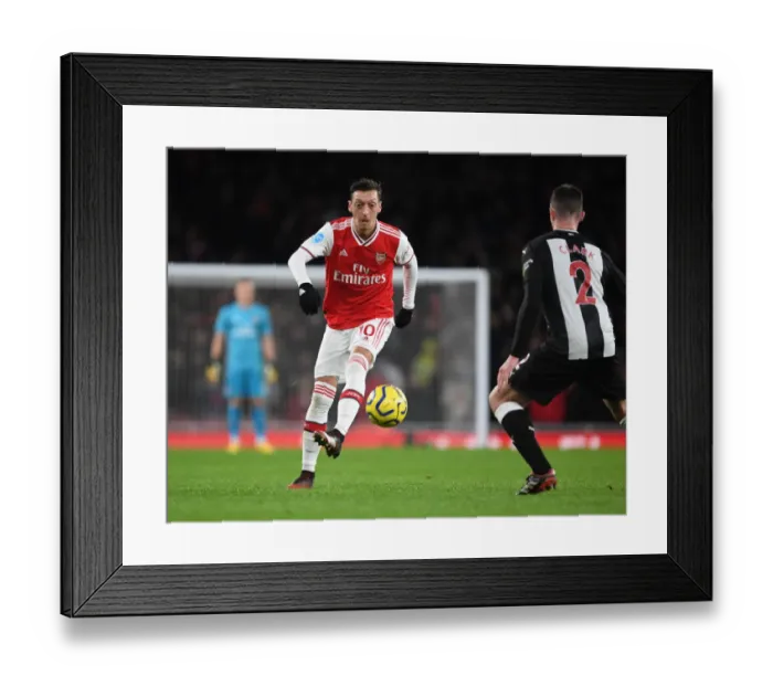 Framed Print : Arsenal vs Newcastle United: Premier League Showdown at Emirates Stadium