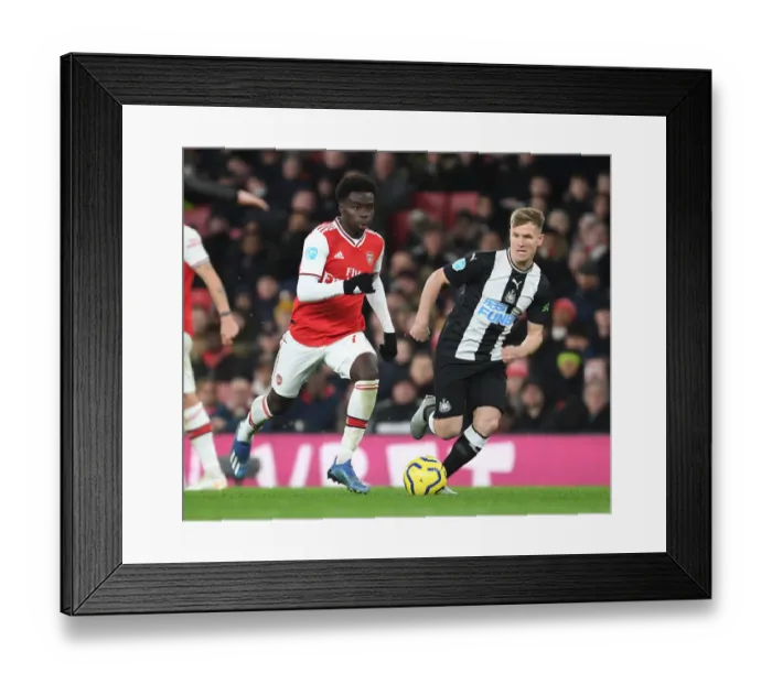 Framed Print : Arsenal vs Newcastle United: Premier League Clash at Emirates Stadium