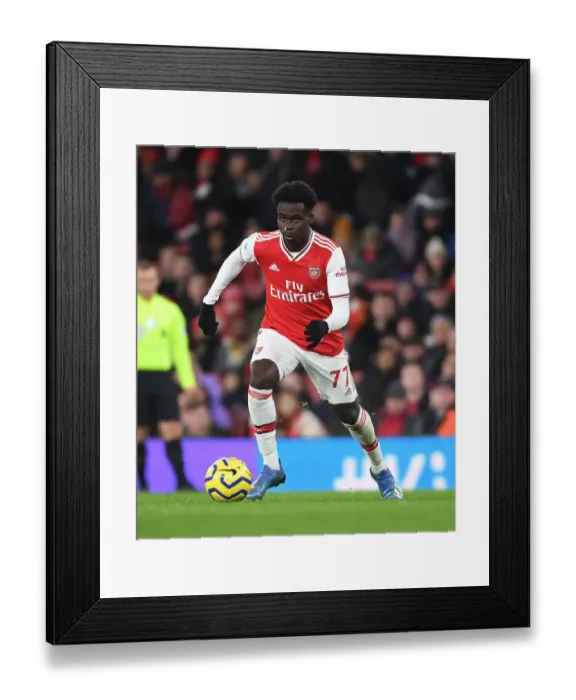 Framed Print : Arsenal vs Newcastle United: Premier League Showdown at Emirates Stadium