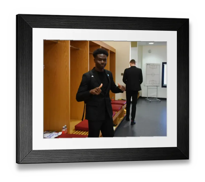 Framed Print : Arsenal FC: Bukayo Saka in the Changing Room - Arsenal vs Newcastle United, Premier League (2019-20)