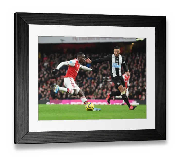 Framed Print : Arsenal vs Newcastle United: Premier League Showdown at Emirates Stadium
