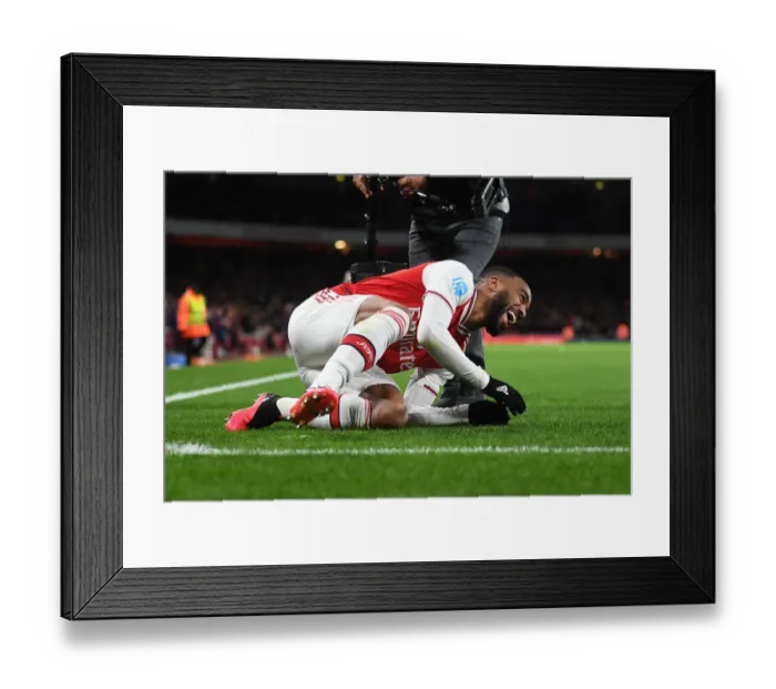Framed Print : Arsenal's Lacazette Scores Fourth Goal in Thrilling Victory over Newcastle United Framed Print : Arsenal's Lacazette Scores Fourth Goal in Thrilling Victory over Newcastle United
