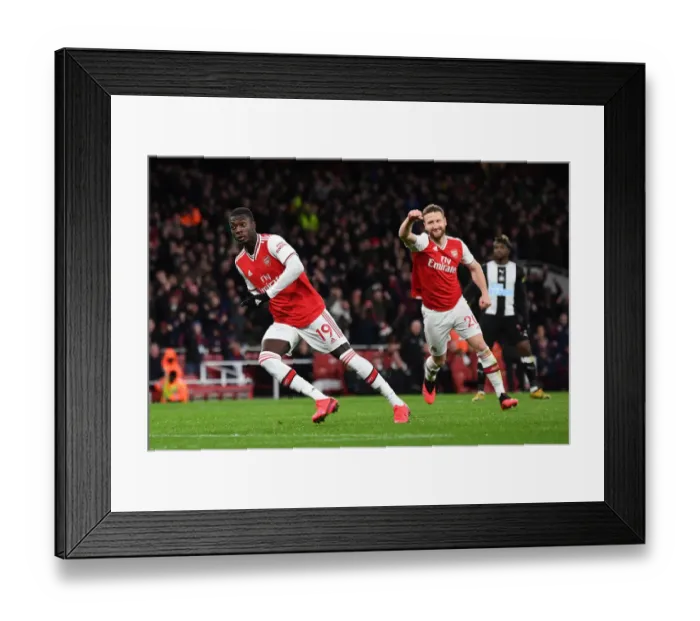 Framed Print : Nicolas Pepe Scores His Second Goal: Arsenal's Triumph Over Newcastle United in the Premier League Framed Print : Nicolas Pepe Scores His Second Goal: Arsenal's Triumph Over Newcastle United in the Premier League