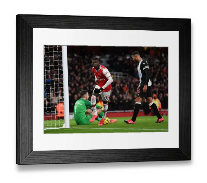 Framed Print : Nicolas Pepe Scores His Second Goal: Arsenal's Triumph over Newcastle United (Premier League 2019-20)