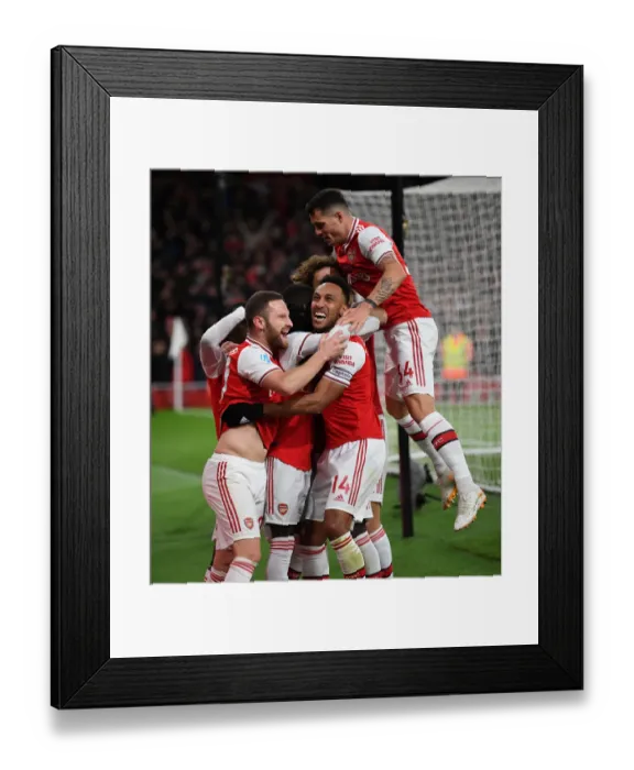 Framed Print : Arsenal's Pepe, Aubameyang, Mustafi, and Xhaka Celebrate Goals Against Newcastle United Framed Print : Arsenal's Pepe, Aubameyang, Mustafi, and Xhaka Celebrate Goals Against Newcastle United