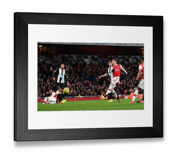 Framed Print : Mesut Ozil Scores Arsenal's Third Goal vs. Newcastle United (Premier League 2019-20)