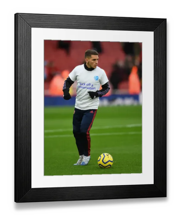 Framed Print : Arsenal's Lucas Torreira Wears Heads Up Shirt During Warm-Up vs Newcastle United (Arsenal v Newcastle, Premier League 2019-20)