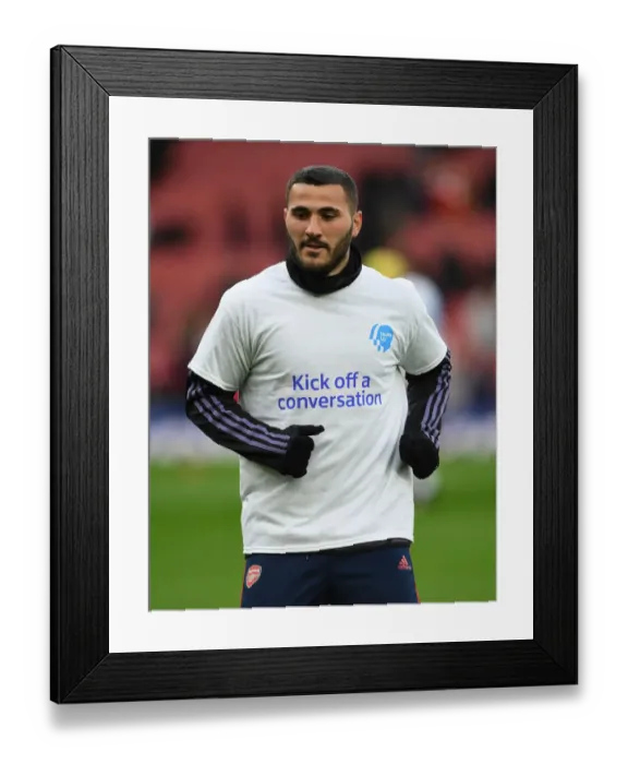 Framed Print : Arsenal's Sead Kolasinac Warms Up Ahead of Arsenal v Newcastle United Premier League Clash