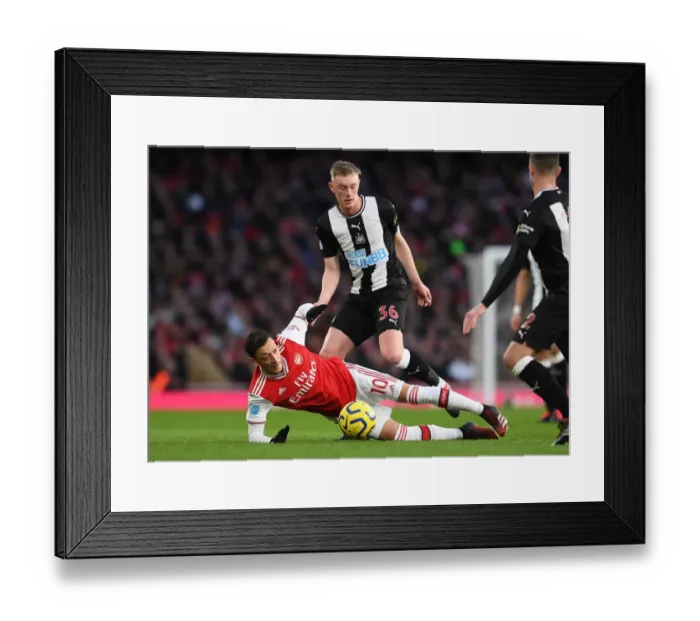 Framed Print : Arsenal vs Newcastle: Ozil vs Longstaff Clash in Premier League Showdown Framed Print : Arsenal vs Newcastle: Ozil vs Longstaff Clash in Premier League Showdown