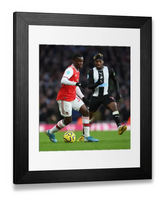 Framed Print : Arsenal vs Newcastle: Pepe and Saint-Maximin Clash in Premier League Showdown