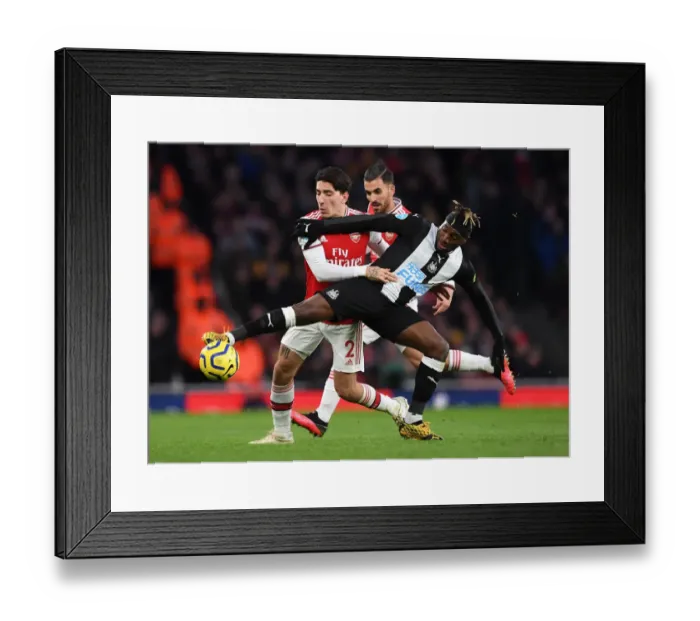 Framed Print : Arsenal vs Newcastle: Bellerin vs Saint-Maximin Clash in Premier League Showdown