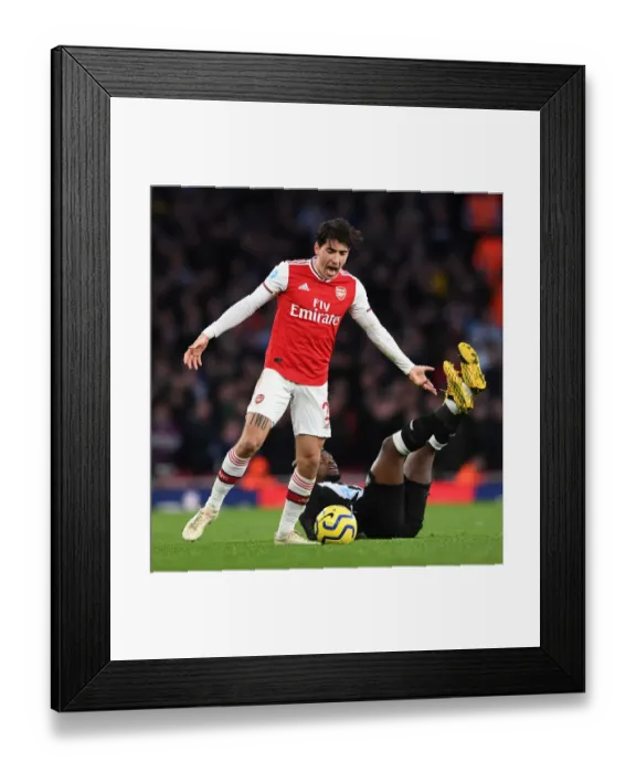 Framed Print : Arsenal's Bellerin vs. Newcastle's Saint-Maximin: A Premier League Showdown at Emirates Stadium