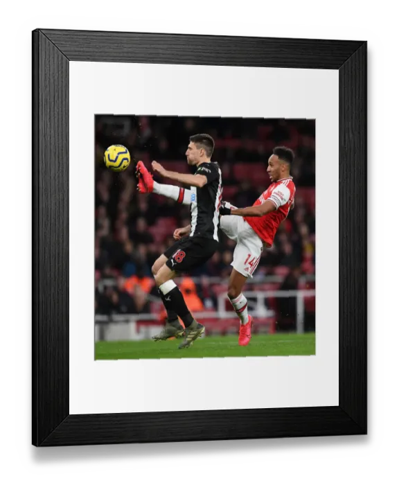 Framed Print : Arsenal vs Newcastle: Aubameyang Clashes with Fernandez in Premier League Showdown Framed Print : Arsenal vs Newcastle: Aubameyang Clashes with Fernandez in Premier League Showdown