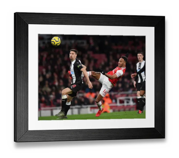 Framed Print : Arsenal vs Newcastle: Aubameyang vs Fernandez - Premier League Showdown at Emirates Stadium