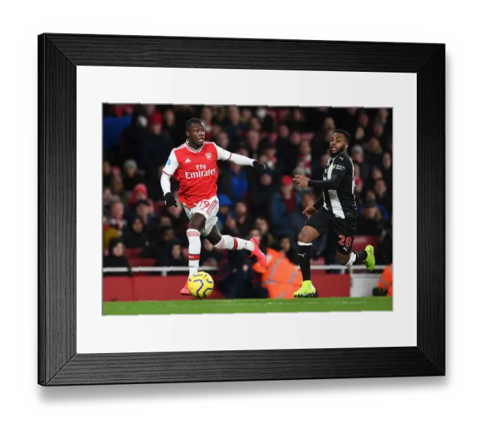 Framed Print : Pepe vs. Rose: Intense Clash in Arsenal's Premier League Battle against Newcastle Framed Print : Pepe vs. Rose: Intense Clash in Arsenal's Premier League Battle against Newcastle