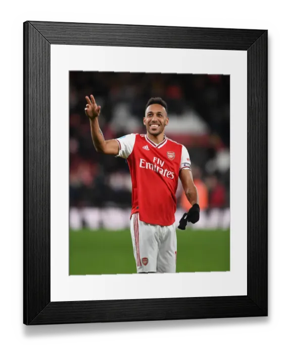 Framed Print : Arsenal's Aubameyang Celebrates Victory Over Newcastle United in Premier League