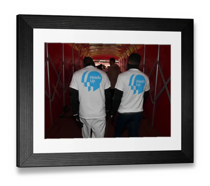Framed Print : Arsenal Players Warm Up in Heads Up Shirts Before Arsenal v Newcastle United, Premier League 2019-2020