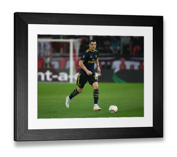 Framed Print : Arsenal Takes on Olympiacos in UEFA Europa League Round of 32, First Leg Framed Print : Arsenal Takes on Olympiacos in UEFA Europa League Round of 32, First Leg