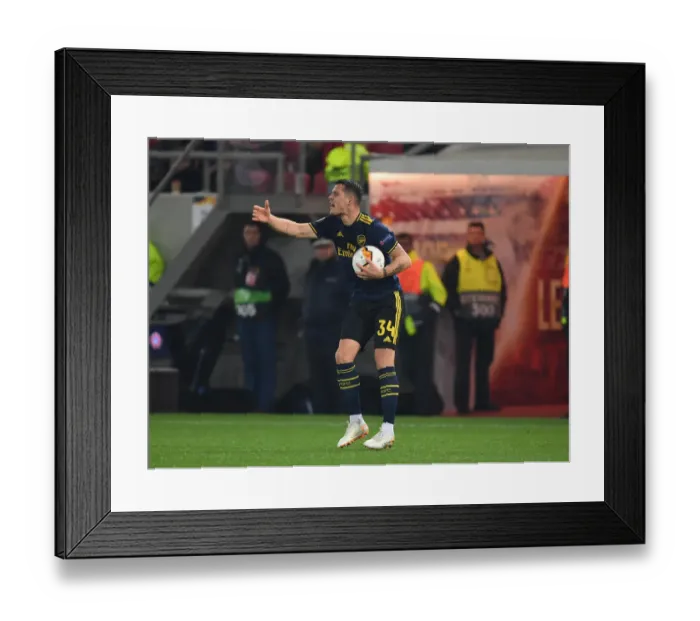 Framed Print : Arsenal vs. Olympiacos: Europa League Battle at Karaiskakis Stadium