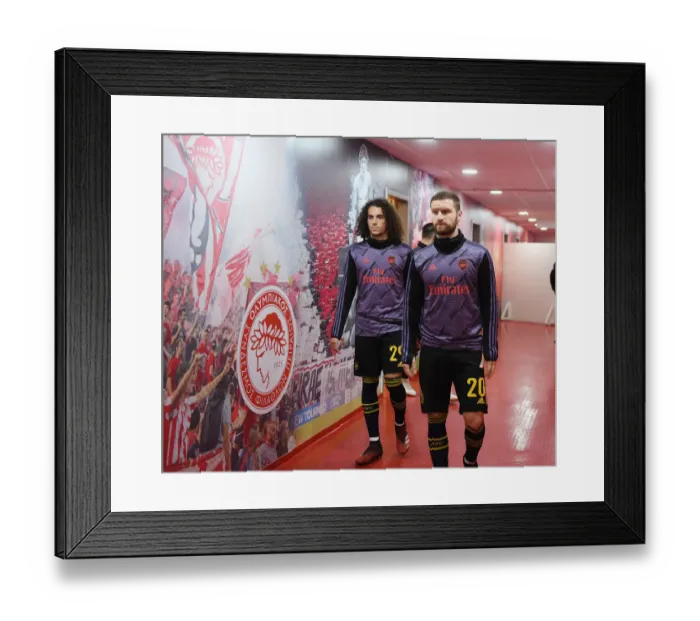 Framed Print : Arsenal vs. Olympiacos: Europa League Showdown - Arsenal Player in Action (2020) Framed Print : Arsenal vs. Olympiacos: Europa League Showdown - Arsenal Player in Action (2020)