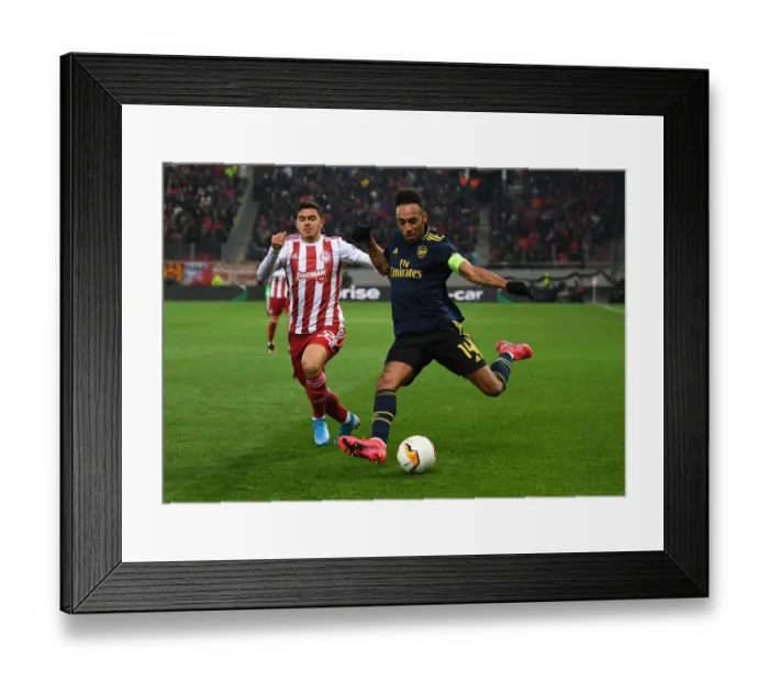 Framed Print : Arsenal's Aubameyang Faces Off Against Olympiacos Lovera in Europa League Clash Framed Print : Arsenal's Aubameyang Faces Off Against Olympiacos Lovera in Europa League Clash