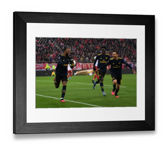 Framed Print : Alexandre Lacazette's Goal Celebration: Arsenal's Victory Moment against Olympiacos in UEFA Europa League Framed Print : Alexandre Lacazette's Goal Celebration: Arsenal's Victory Moment against Olympiacos in UEFA Europa League