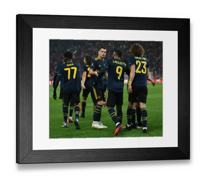 Framed Print : Alexandre Lacazette and Granit Xhaka Celebrate Goal: Arsenal's Victory Moment vs. Olympiacos in Europa League