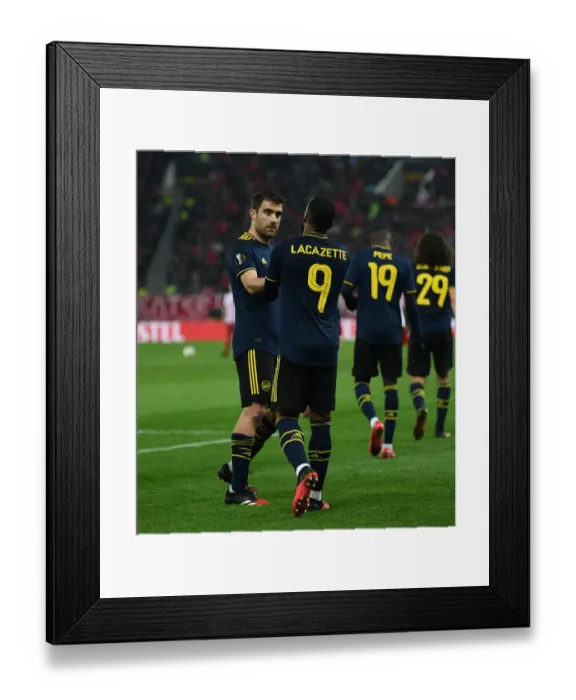 Framed Print : Arsenal's Lacazette Scores in Europa League Clash vs. Olympiacos