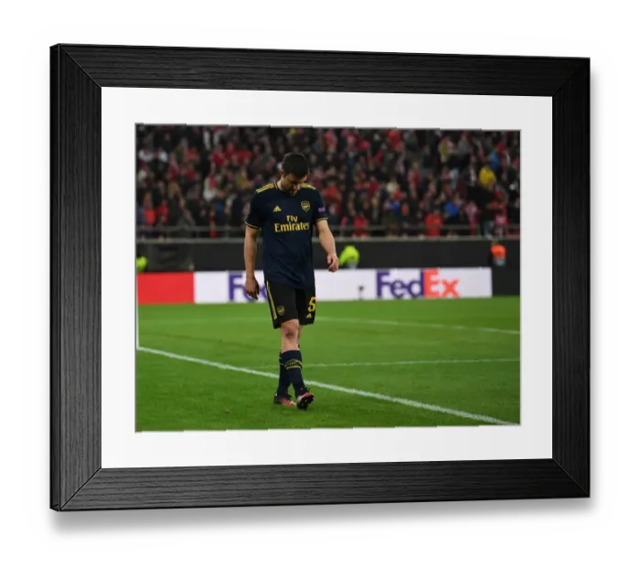 Framed Print : Sokratis of Arsenal in Action against Olympiacos in UEFA Europa League Round of 32 First Leg