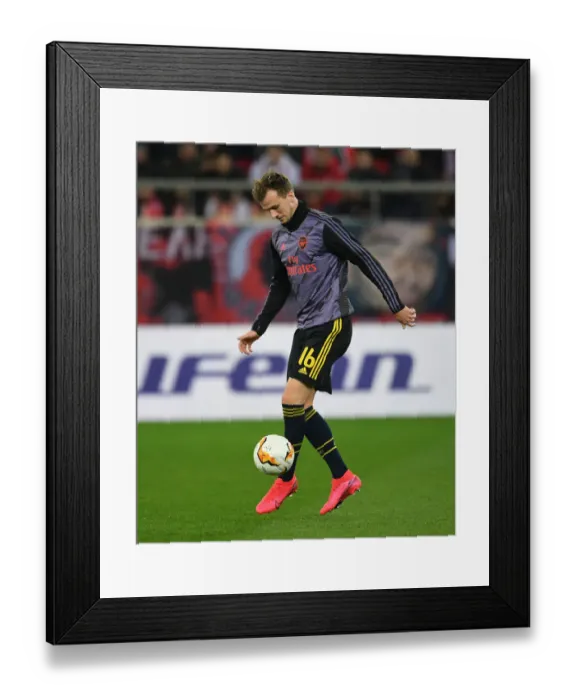 Framed Print : Arsenal's Rob Holding Prepares for Olympiacos Showdown in Europa League
