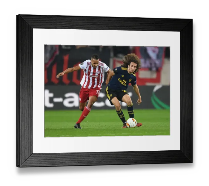 Framed Print : Guendouzi vs. Christodoulopoulos: Olympiacos vs. Arsenal, UEFA Europa League 2019-20: Intense Clash in Piraeus Framed Print : Guendouzi vs. Christodoulopoulos: Olympiacos vs. Arsenal, UEFA Europa League 2019-20: Intense Clash in Piraeus