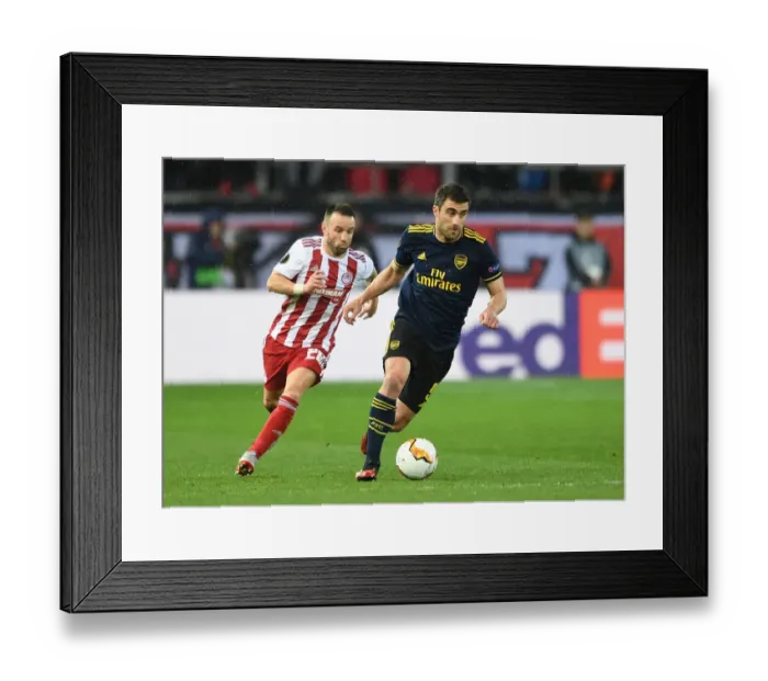 Framed Print : Sokratis Clashes with Valbuena: Olympiacos vs. Arsenal, UEFA Europa League 2019-20 Round of 32 - First Leg