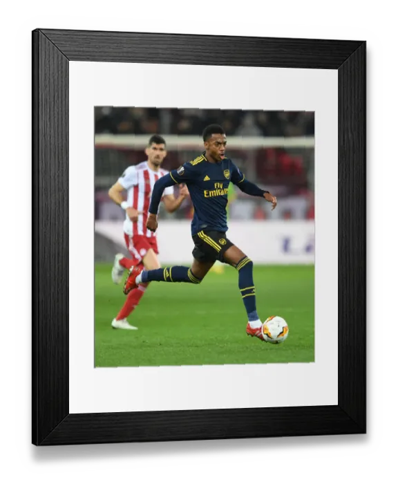 Framed Print : Arsenal's Joe Willock in Action against Olympiacos in UEFA Europa League Round of 32, Piraeus 2020 Framed Print : Arsenal's Joe Willock in Action against Olympiacos in UEFA Europa League Round of 32, Piraeus 2020