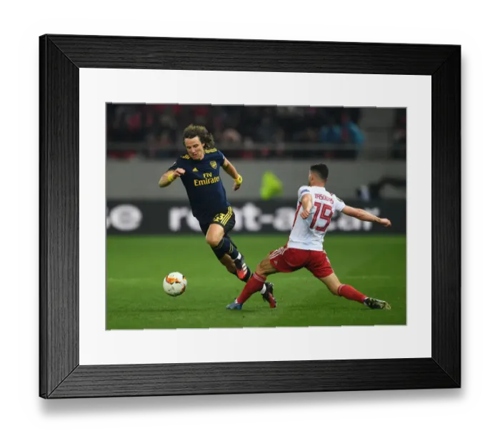 Framed Print : Arsenal's David Luiz Clashes with Olympiacos Giorgos Masouras in Europa League Showdown