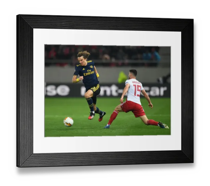 Framed Print : David Luiz vs. Giorgos Masouras: Arsenal's Battle in the UEFA Europa League Against Olympiacos