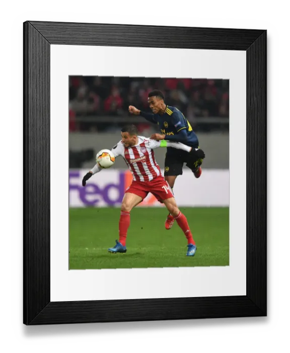 Framed Print : Arsenal's Joe Willock Faces Off Against Olympiacos Omar Elabdellaoui in Europa League Clash Framed Print : Arsenal's Joe Willock Faces Off Against Olympiacos Omar Elabdellaoui in Europa League Clash