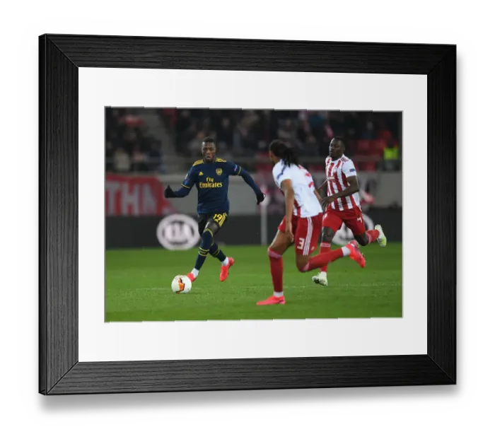 Framed Print : Nicolas Pepe in Action: Olympiacos vs Arsenal, UEFA Europa League Round of 32 - Piraeus, 2020 Framed Print : Nicolas Pepe in Action: Olympiacos vs Arsenal, UEFA Europa League Round of 32 - Piraeus, 2020