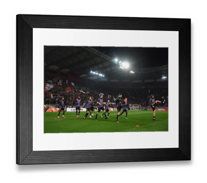 Framed Print : Arsenal Players Warm Up Ahead of Olympiacos Clash in Europa League Framed Print : Arsenal Players Warm Up Ahead of Olympiacos Clash in Europa League