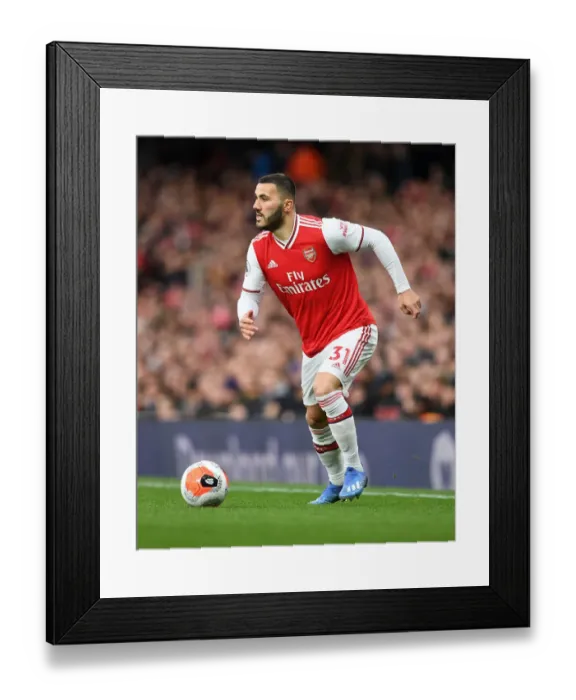 Framed Print : Arsenal's Sead Kolasinac in Action Against Everton in Premier League