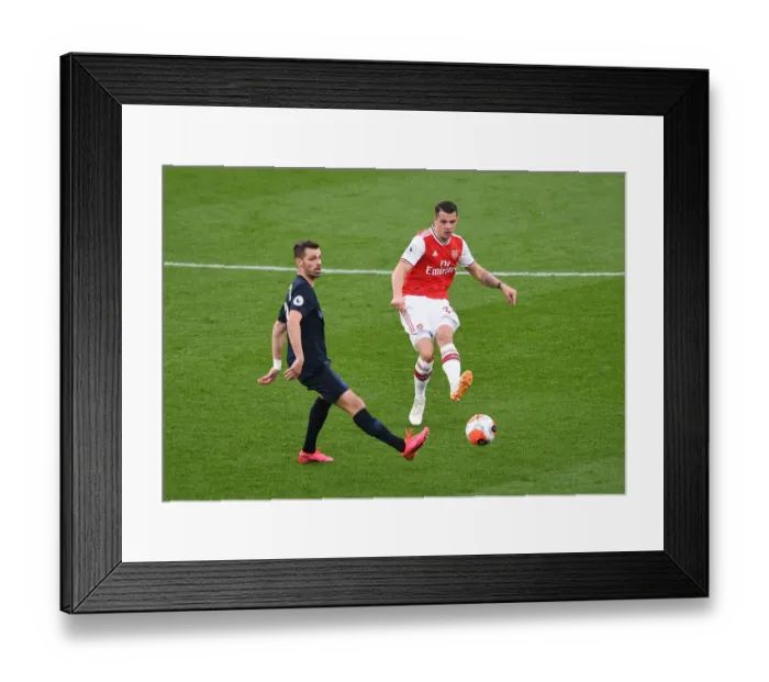 Framed Print : Arsenal's Xhaka Faces Off Against Schneiderlin Amidst Premier League Tension (Arsenal v Everton, 2019-20) Framed Print : Arsenal's Xhaka Faces Off Against Schneiderlin Amidst Premier League Tension (Arsenal v Everton, 2019-20)