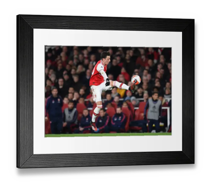Framed Print : Arsenal's Mesut Ozil in Action Against Everton in the Premier League