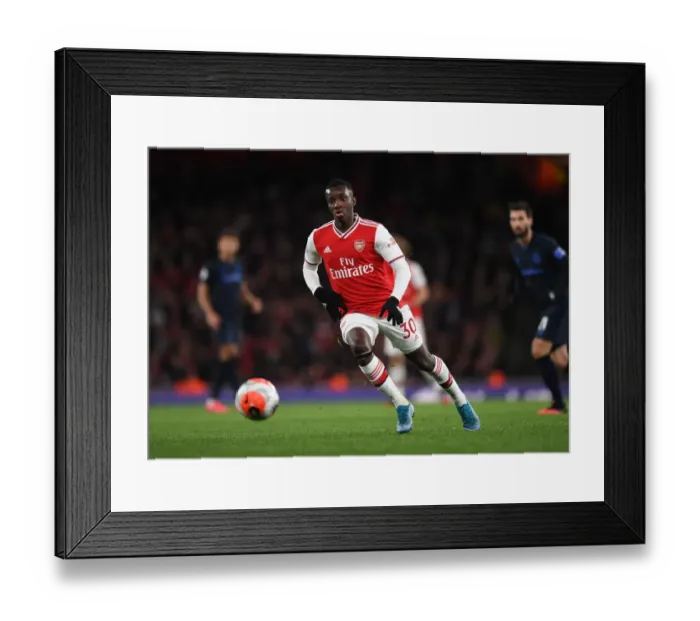 Framed Print : Arsenal's Eddie Nketiah in Action against Everton in Premier League Clash at Emirates Stadium