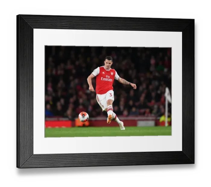 Framed Print : Granit Xhaka: Arsenal's Midfield Maestro in Action Against Everton, Premier League 2019-20