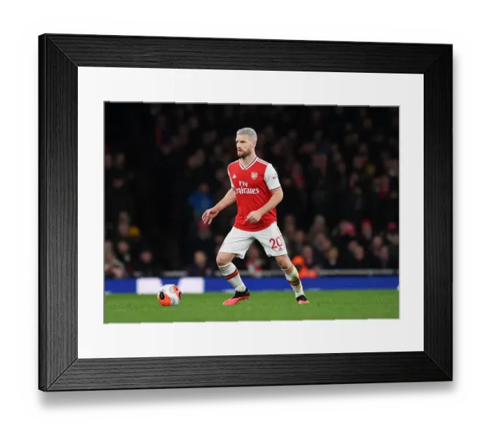 Framed Print : Arsenal's Mustafi in Action: Premier League Clash Against Everton (2019-20) Framed Print : Arsenal's Mustafi in Action: Premier League Clash Against Everton (2019-20)