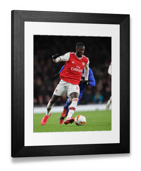 Framed Print : Arsenal's Nicolas Pepe in Action: Europa League Showdown Against Olympiacos
