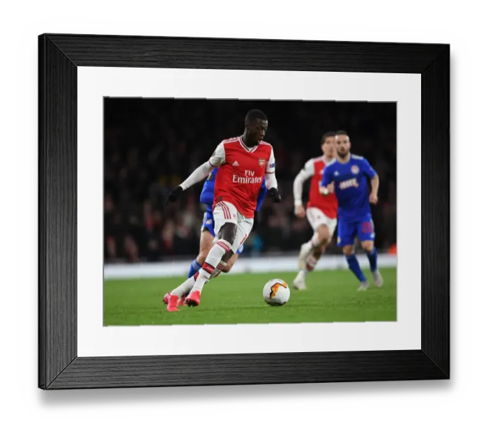 Framed Print : Arsenal's Nicolas Pepe in Action: Thrilling Moments from the Arsenal vs. Olympiacos Europa League Clash, 2020 Framed Print : Arsenal's Nicolas Pepe in Action: Thrilling Moments from the Arsenal vs. Olympiacos Europa League Clash, 2020