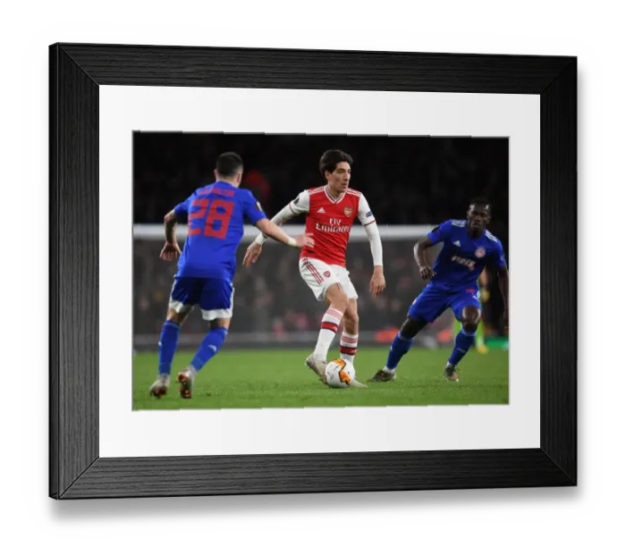 Framed Print : Arsenal's Hector Bellerin Scores Past Olympiacos Mathieu Valbuena in Europa League Clash