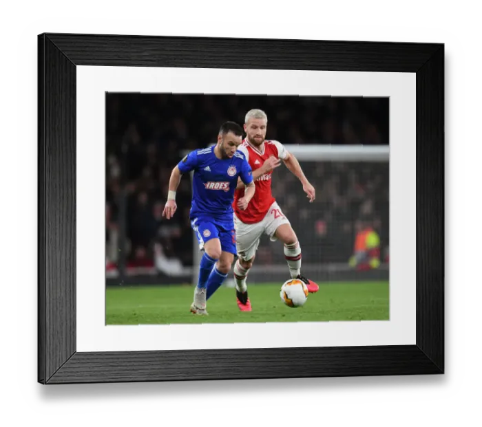 Framed Print : Arsenal vs Olympiacos: Europa League Clash at Emirates Stadium